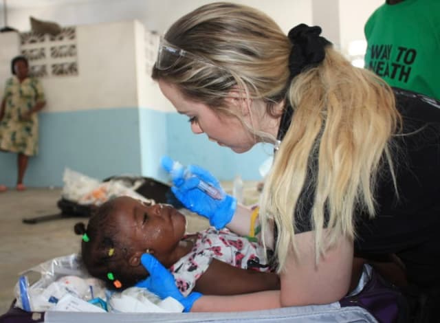 Caring for children in Cité Soleil